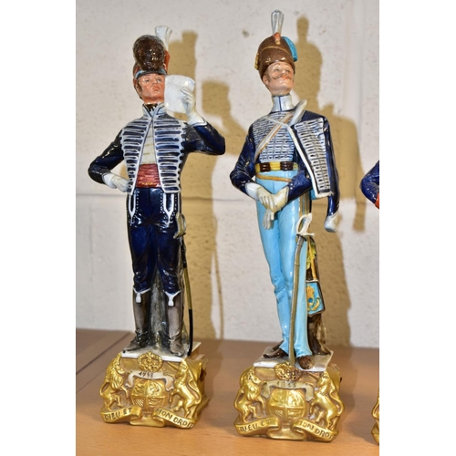 469 - SIX CAPODIMONTE BRUNO MERLI FIGURES OF SOLDIERS IN HISTORICAL COSTUME OF 1798-1844, modelled as stan... 