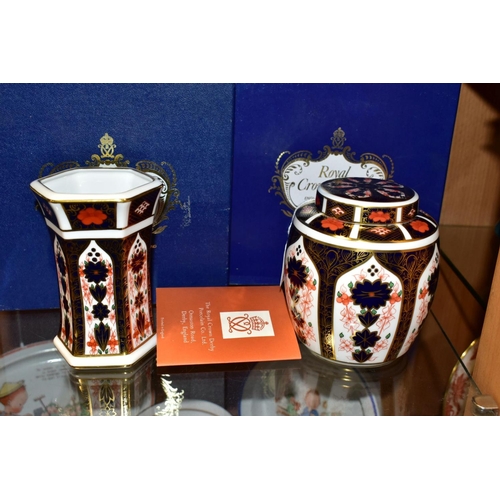 482 - TWO PIECES OF BOXED ROYAL CROWN DERBY 1128 IMARI, comprising a ginger jar and cover, height 11cm and... 