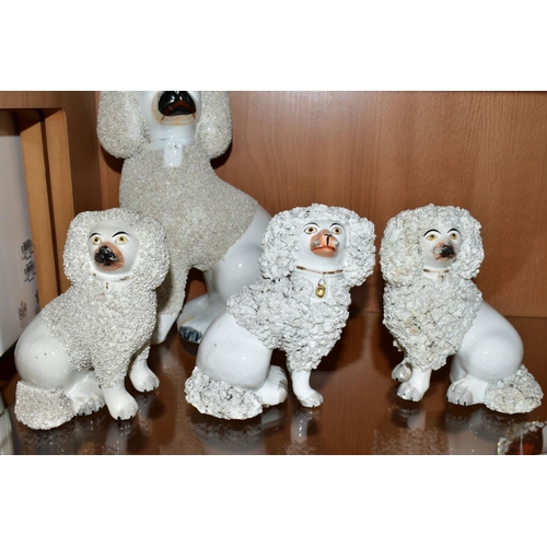 493 - SIX VICTORIAN STAFFORDSHIRE WHITE GLAZED AND FRIT DECORATED POODLE FIGURES AND A SIMILAR SMALL CONTI... 