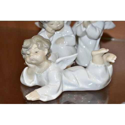 499 - FOUR LLADRO FIGURES OF ANGELS, comprising 'Angel Praying', No. 4538, 'Angel Thinking', No. 4539, 'An... 