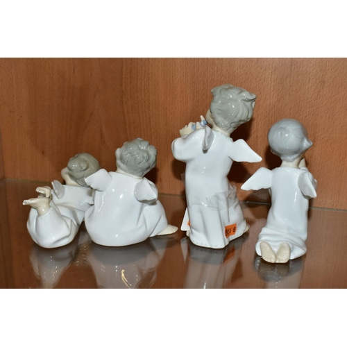 499 - FOUR LLADRO FIGURES OF ANGELS, comprising 'Angel Praying', No. 4538, 'Angel Thinking', No. 4539, 'An... 