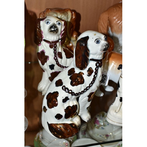 506 - NINE STAFFORDSHIRE/STAFFORDSHIRE STYLE DOGS, to include a pair of porcelain, probably German, pugs, ... 