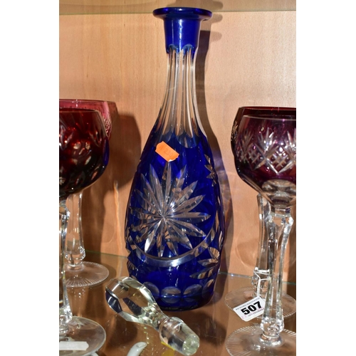 507 - A BOHEMIAN GLASS CUT TO CLEAR DECANTER WITH EIGHT HOCK GLASSES, comprising a cobalt blue cut to clea... 