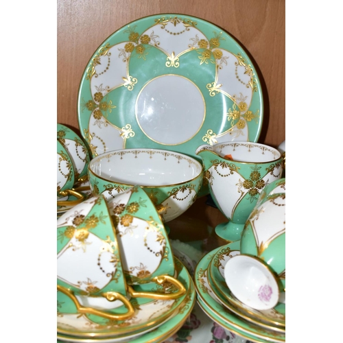 511 - A THIRTY NINE PIECE 1930s ROYAL WORCESTER TEA SET, pattern number Z1357, with gilded flowers and fol... 