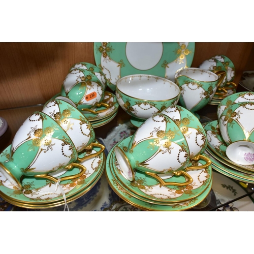 511 - A THIRTY NINE PIECE 1930s ROYAL WORCESTER TEA SET, pattern number Z1357, with gilded flowers and fol... 