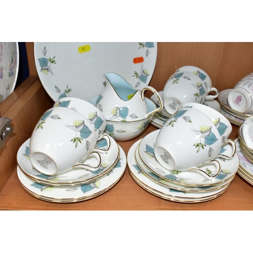 521 - A FORTY PIECE MINTON PETUNIA TEA SET WITH A TWENTY ONE PIECE FOLEY WIND FLOWER TEA SET, the Minton s... 