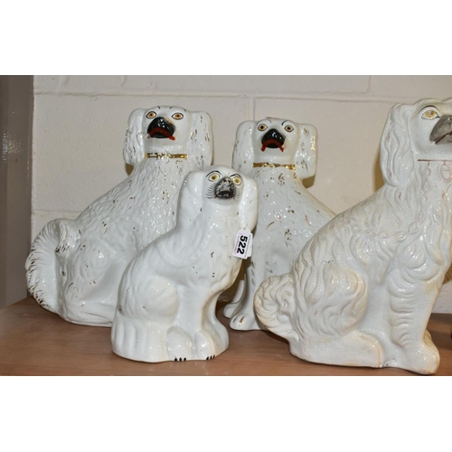 522 - SIX STAFFORDSHIRE SPANIELS, white glazed with gilt details, comprising two pairs approximate heights... 