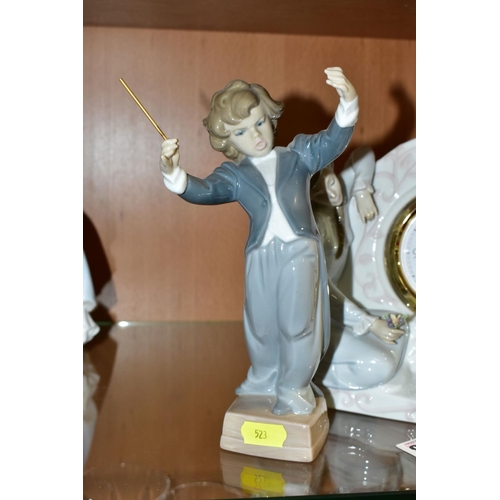 523 - BOXED LLADRO CLOCK AND FIGURINE, comprising a Swan Clock 5777, height 18cm x width 26cm x depth 9cm,... 