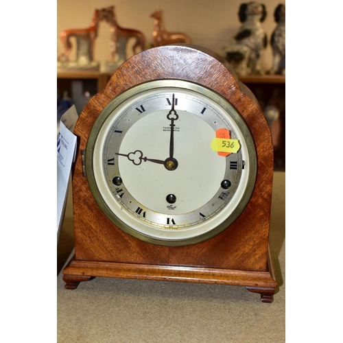 536 - A MID 20TH CENTURY WALNUT ARCH CASED ELLIOT MANTEL CLOCK, silvered chapter ring with Roman numerals,... 