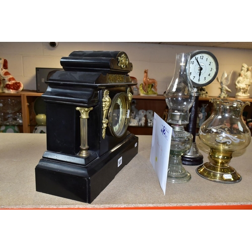 537 - A LATE VICTORIAN BLACK SLATE MANTEL CLOCK OF ARCHITECTURAL FORM, enamel dial with Arabic numerals, c... 