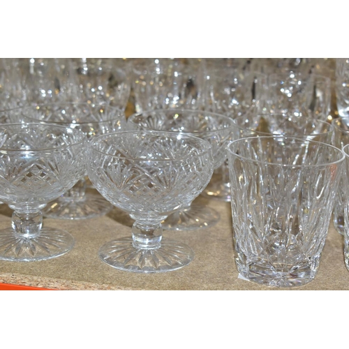 541 - A QUANTITY OF CUT GLASS DRINKING GLASSES, twelve sets/part sets of glasses with some pairs and singl... 