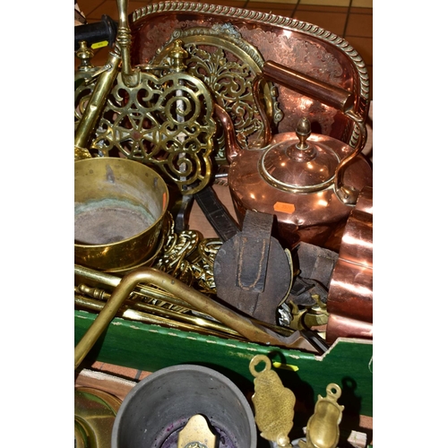 547 - TWO BOXES OF METALWARES, to include brass trivets, horse brasses, a copper ring mould, brass candles... 