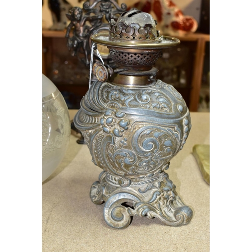 550 - A GROUP OF VICTORIAN / EDWARDIAN METALWARES, comprising a cast metal novelty oil lamp in the form of... 