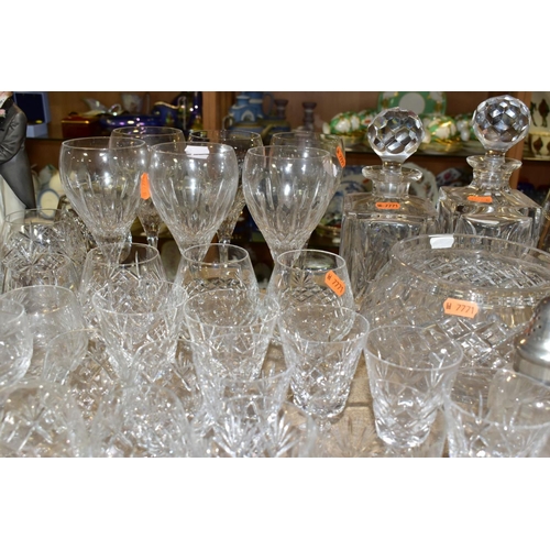 552 - A QUANTITY OF CUT CRYSTAL AND OTHER GLASSWARES, approximately sixty pieces to include a Dartington d... 