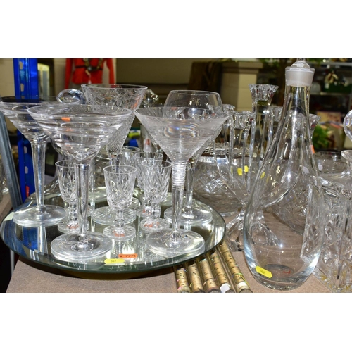 552 - A QUANTITY OF CUT CRYSTAL AND OTHER GLASSWARES, approximately sixty pieces to include a Dartington d... 