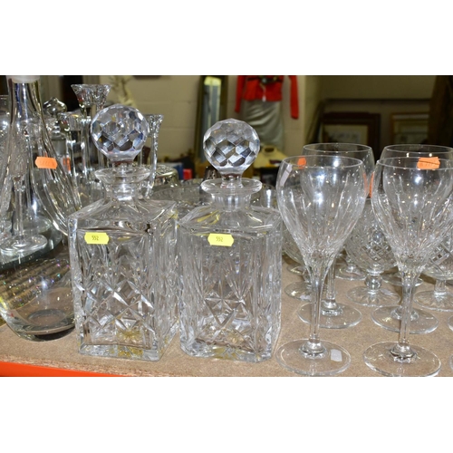 552 - A QUANTITY OF CUT CRYSTAL AND OTHER GLASSWARES, approximately sixty pieces to include a Dartington d... 