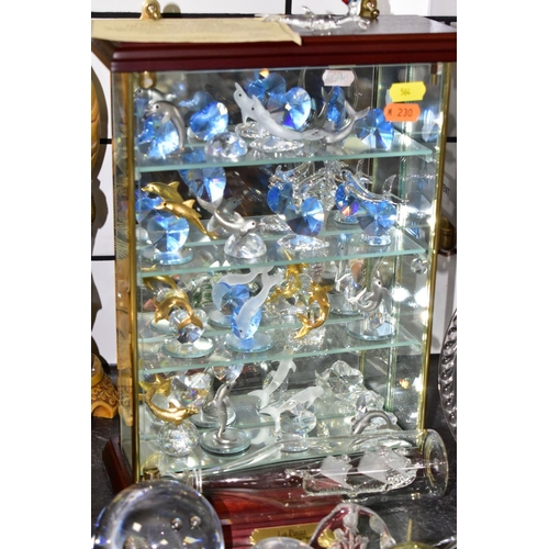 564 - A GROUP OF DECORATIVE GLASSWARES AND DISPLAY CABINET, to include a Brooks & Bentley 'The Crystal Hea... 