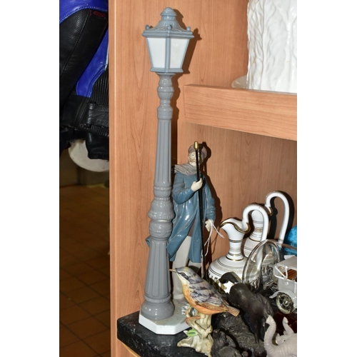 571 - A GROUP OF CERAMICS, ORNAMENTS AND COLLECTORS DOLLS, to include a Lladro Lamplighter figurine, no 52... 