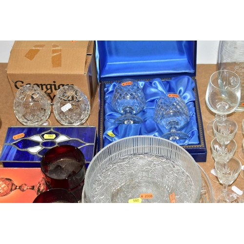 582 - A QUANTITY OF CUT CRYSTAL AND OTHER GLASSWARES, approximately sixty pieces to include a boxed pair o... 