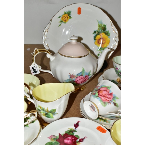 586 - FORTY ONE PIECES OF HARRY WHEATCROFT SIX WORLD FAMOUS ROSES TEA WARES, by different manufacturers: P... 