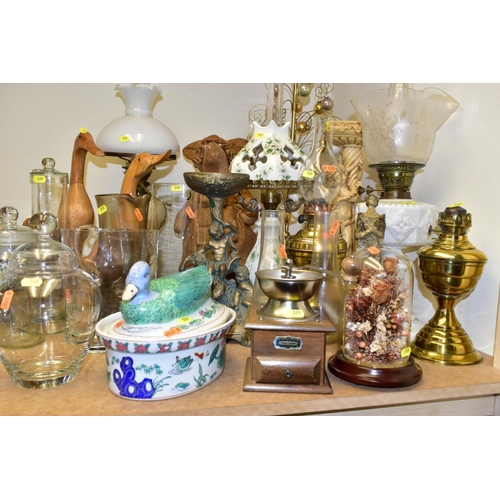 599 - A QUANTITY OF OIL LAMPS, PLANTERS, WOODEN DUCKS, ETC, to include a late Victorian white opaque press... 