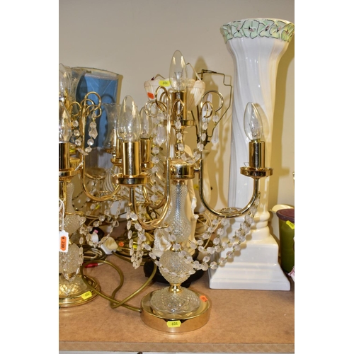 604 - A COLLECTION OF THIRTEEN LAMPS AND THREE  FLOORSTANDING VASES including four matching ornate glass c... 