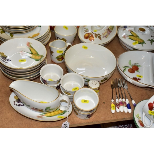 609 - ROYAL WORCESTER PORCELAIN EVESHAM DINNER SERVICE, including twelve serving dishes of various shapes,... 