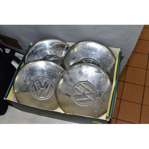 663 - A SET OF FOUR VINTAGE VOLKSWAGON (VW) HUB CAPS, approximate diameter 17cm, together with a Formuling... 