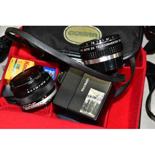 666 - THREE BAGS OF PHOTOGRAPHIC EQUIPMENT ETC, to include an Olympus OM10 camera body with an Olympus 50M... 