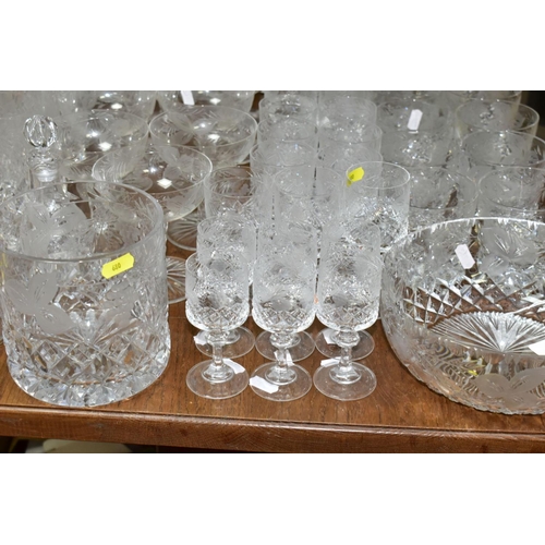 680 - A SUITE OF CUT GLASS WARES, to include ten whisky tumblers, five brandy balloons, eight champagne co... 