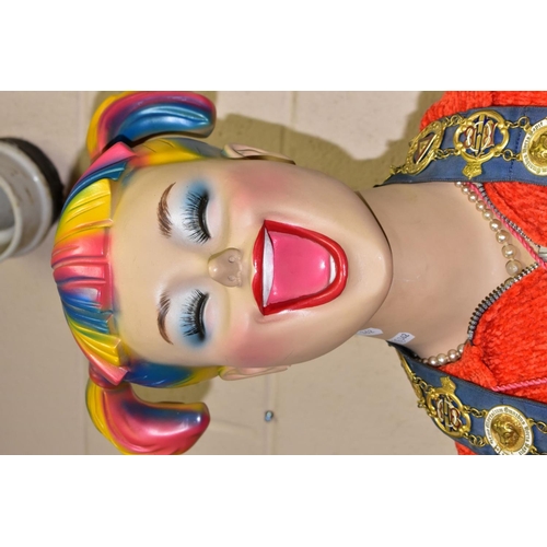 693 - A THREE QUARTER LENGTH FEMALE SHOP MANNEQUIN ON METAL STAND, the face having a quirky expression and... 