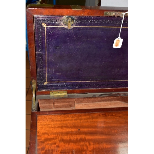 729 - A LARGE MAHOGANY CAMPAIGN STYLE WRITING SLOPE, in need of some restoration, with brass banding, an i... 