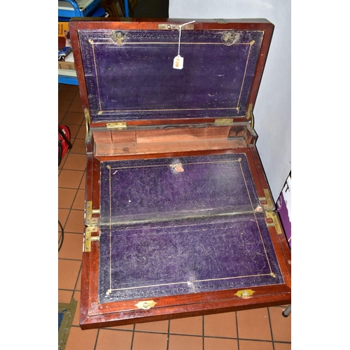 729 - A LARGE MAHOGANY CAMPAIGN STYLE WRITING SLOPE, in need of some restoration, with brass banding, an i... 