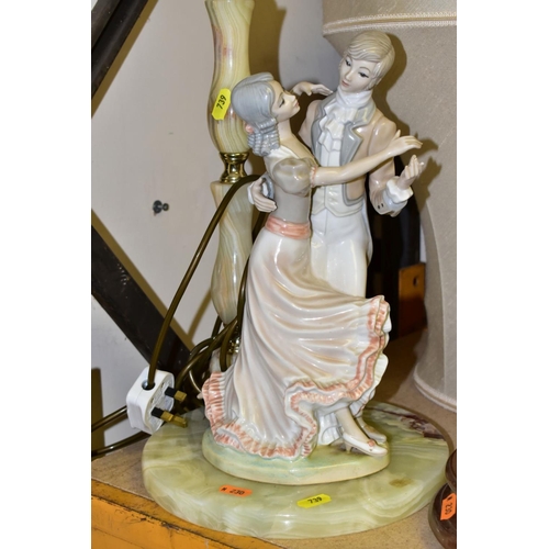 739 - TWO LAMPS, ONE HAS A DANCING COUPLE ON AN ONYX BASE 'Midlands Craft', the other lamp has a pair of h... 