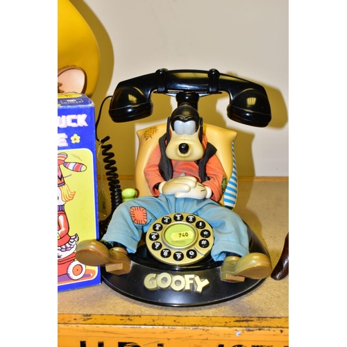 740 - A WARNER BROS 'GOOFY' PUSH BUTTON PHONE (mybelle805), a wind up tin duck on a bike (boxed), also inc... 