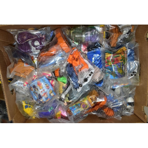 746 - FOUR BOXES CONTAINING OVER 200 MCDONALDS HAPPY MEAL TOYS, IN SEALED PACKETS (DISNEY ETC) , also a bo... 