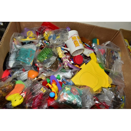 746 - FOUR BOXES CONTAINING OVER 200 MCDONALDS HAPPY MEAL TOYS, IN SEALED PACKETS (DISNEY ETC) , also a bo... 