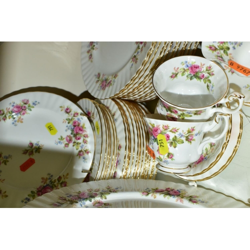 751 - A ROYAL ALBERT 'MOSS ROSE' DESIGN PART DINNER SERVICE, consisting of five cups, six saucers, four te... 