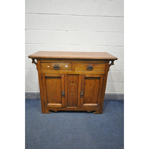 1641 - AN ARTS AND CRAFTS OAK SIDEBOARD, with two drawers over double cupboard doors, width 121cm x depth 5... 