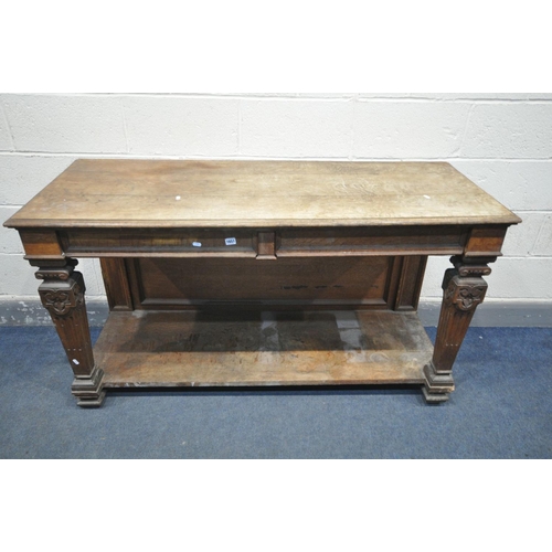 1651 - AN EARLY 20TH CENTURY OAK SIDE TABLE, with two drawers, square tapered Corinthian columns, united by... 