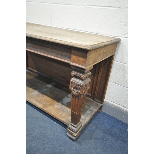 1651 - AN EARLY 20TH CENTURY OAK SIDE TABLE, with two drawers, square tapered Corinthian columns, united by... 