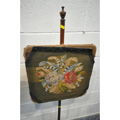 1653 - A VICTORIAN WALNUT POLE SCREEN, with a silk needlework shield panel, on a turned support and tripod ... 