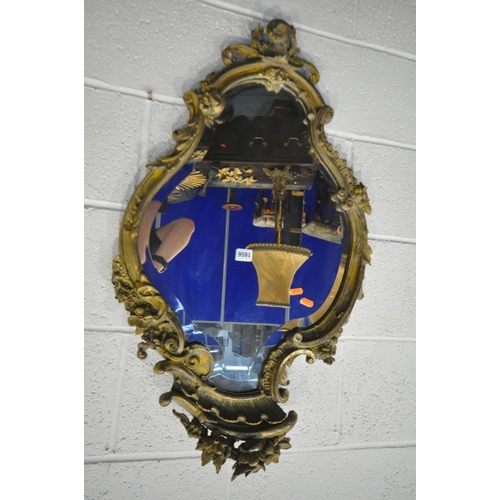 1656 - A 19TH CENTURY GILT FRAMED ROCOCO WALL MIRROR, 52cm x 90cm