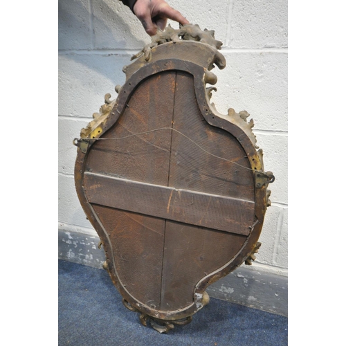 1656 - A 19TH CENTURY GILT FRAMED ROCOCO WALL MIRROR, 52cm x 90cm