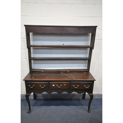 1660 - A GEORGIAN OAK DRESSER, with a triple cascading plate rack, and three frieze drawers, on cabriole fr... 