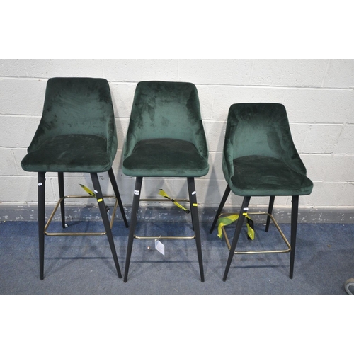 1674 - THREE GREEN VELVET BAR STOOLS, on metal legs, two at 109cm x one at 97cm (condition - some marks to ... 