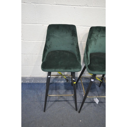 1674 - THREE GREEN VELVET BAR STOOLS, on metal legs, two at 109cm x one at 97cm (condition - some marks to ... 