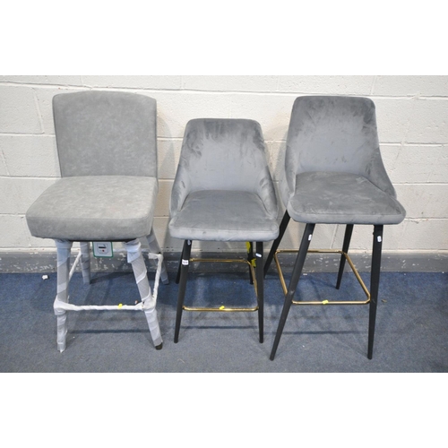 1675 - TWO GREY VELVET METAL FRAMED BAR STOOLS, tallest 108cm x shortest 96cm, along with a swivel bar stoo... 