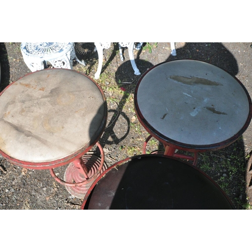 1205 - THREE ART DECO RED PAINTED METAL HIGH STOOLS, with a circular top, and footrest, on a stepped base, ... 