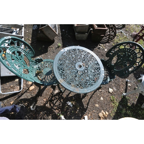 1206 - A GREEN PAINTED ALUMINIUM GARDEN TABLE, diameter 61cm x height 63cm and two chairs (3) (condition:-t... 